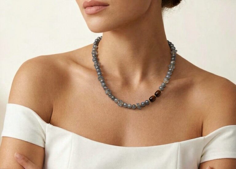 Necklace worn with an open collar