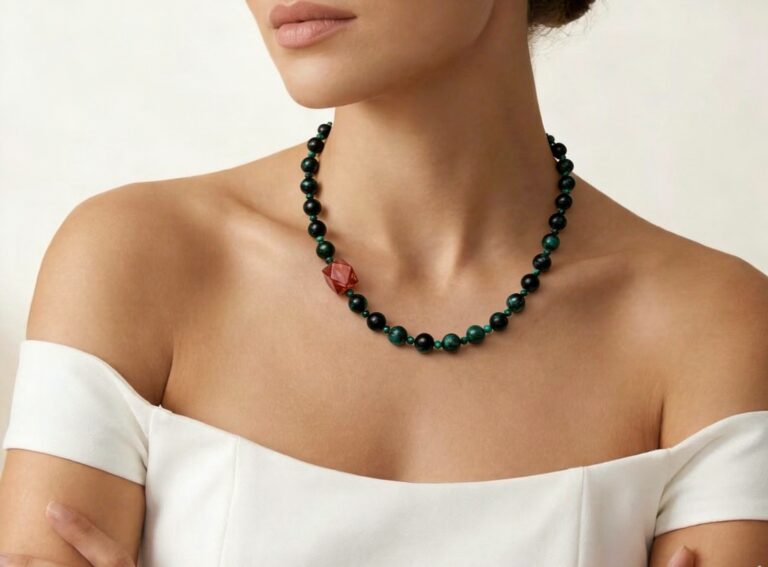Necklace worn with an open collar