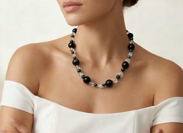 Necklace worn with an open collar