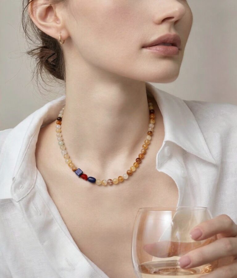 Pendant resting on dried flowers