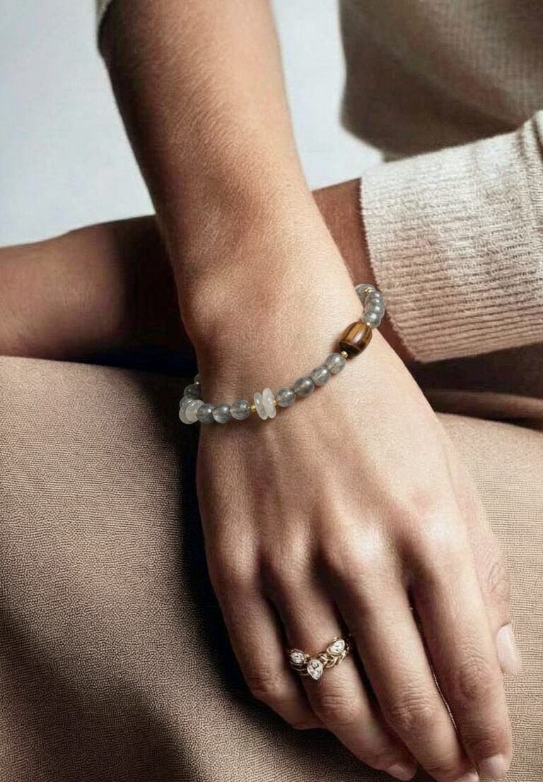 Necklace worn with an open collar