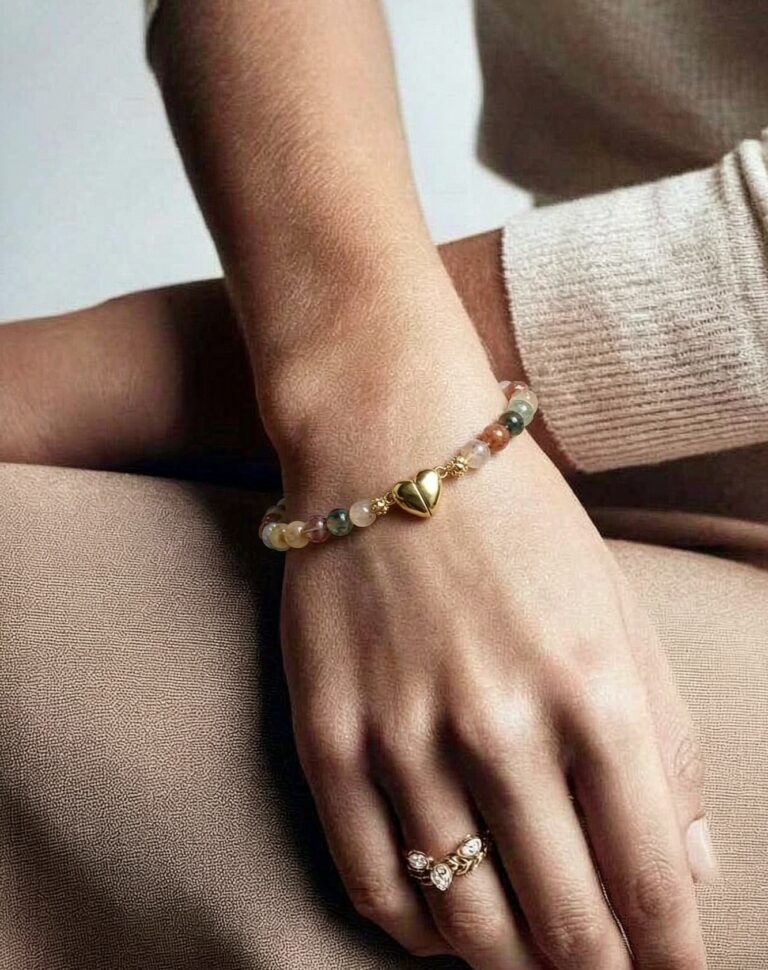 Necklace worn with an open collar