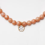 Sunset to Starlight · Orange Moonstone & Lapis Lazuli Necklace with Shell Rose & Crystal Pendant