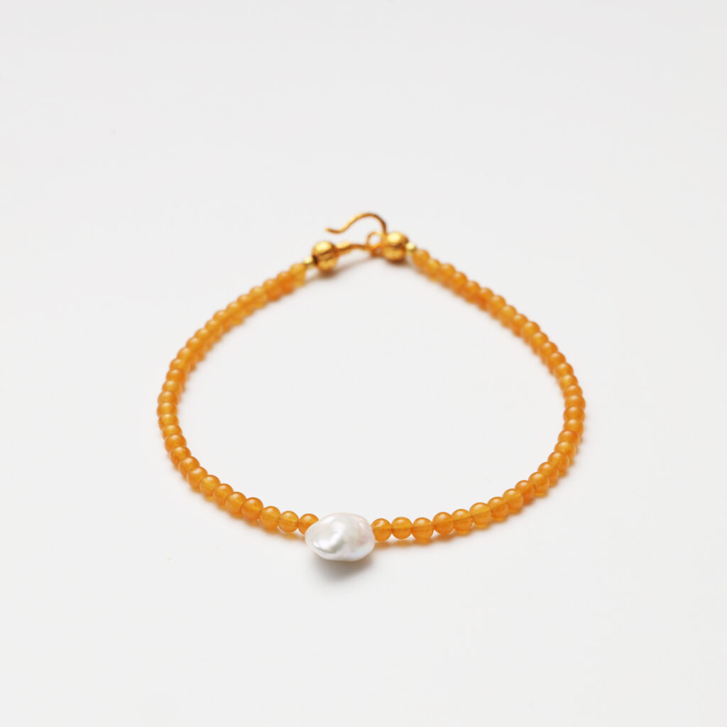 Natural yellow jade bracelet with baroque pearl centerpiece