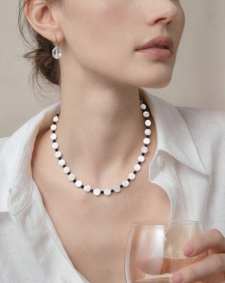 Necklace worn with an open collar