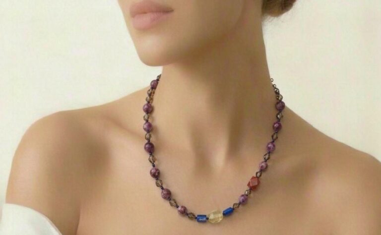 Pendant resting on dried flowers