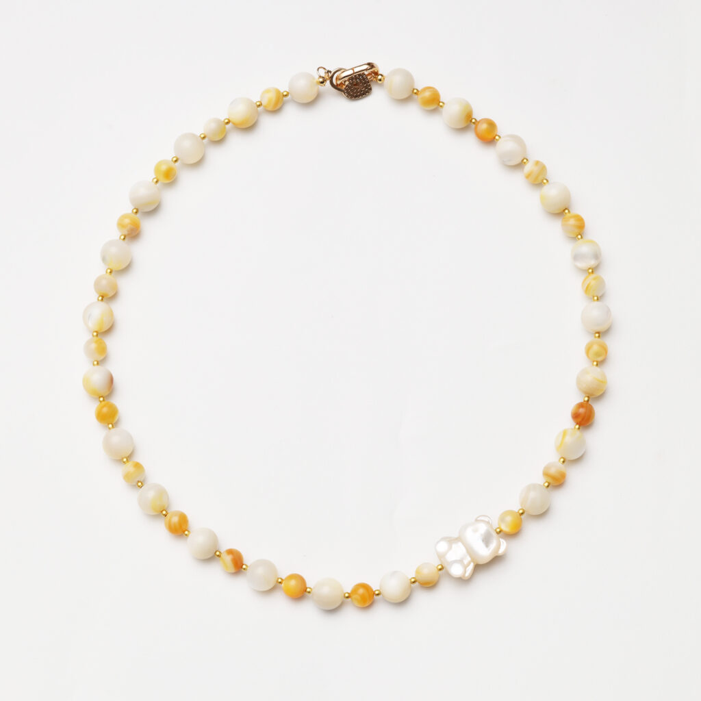 Autumn Haze · Yellow Mother-of-Pearl & Carved Bear Bead Necklace