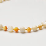 Autumn Haze · Yellow Mother-of-Pearl & Carved Bear Bead Necklace
