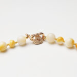 Autumn Haze · Yellow Mother-of-Pearl & Carved Bear Bead Necklace