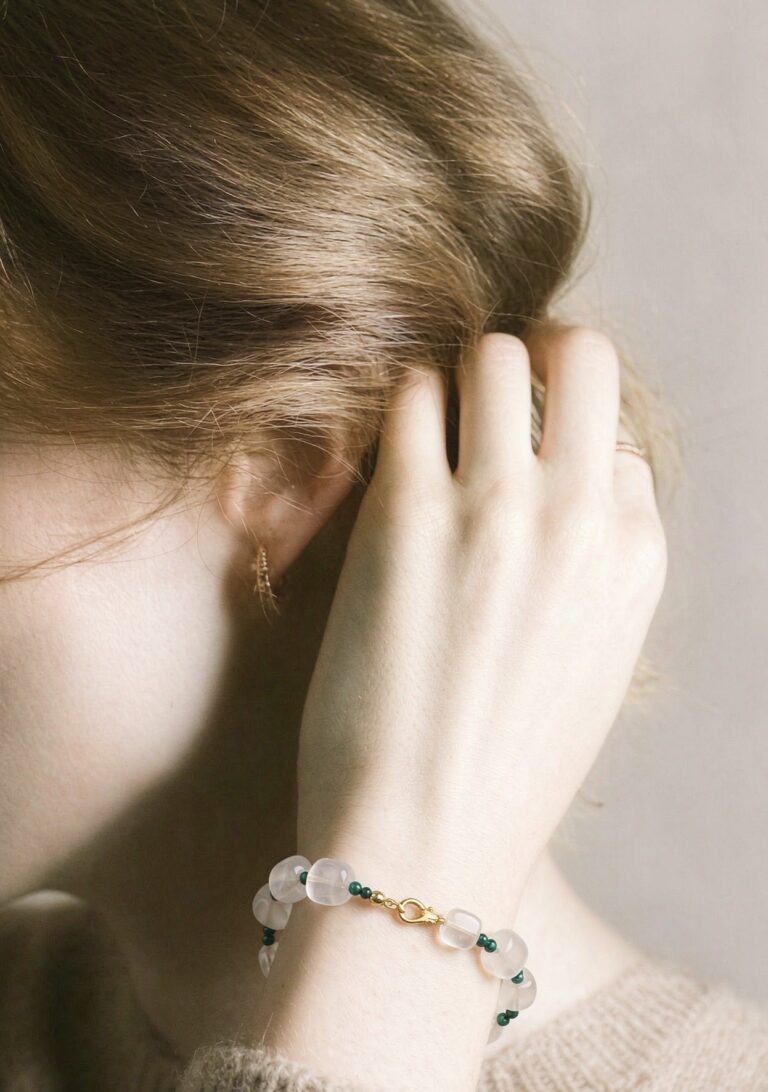 Pendant resting on dried flowers