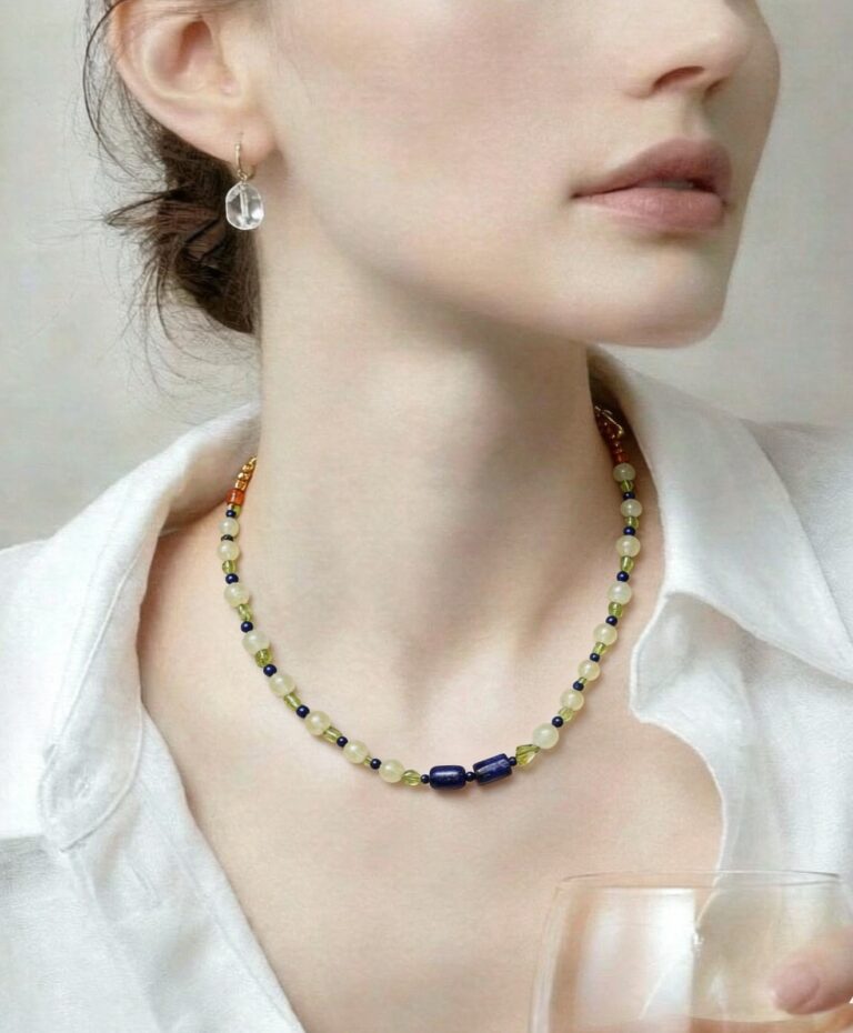 Necklace worn with an open collar